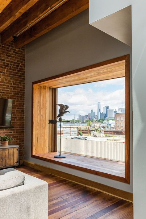 Modern home with Windows, Picture Window Type, and Wood. Bay window is angled to capture Manhattan skyline views Photo 6 of Brooklyn Upside Down with Views Window Seat Design, Bow Window, Modern Windows, House Extensions, Reclaimed Barn Wood, Exposed Brick, Window Design, Basement Ideas, Window Seat