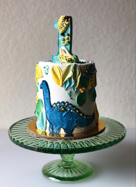 Dinosaur first birthday smash cake in blues, greens and yellows and #1 topper Buttercream Dinosaur Cake, Blue Dinosaur Cake, Dino Smash Cake, Dinosaur First Birthday Cake, Dinosaur Smash Cake, Toddler Birthday Party Themes, Artistic Cake, Dino Birthday Cake, Dinosaur Cakes