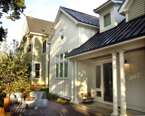 Roof is Dark Bronze and Siding is Dove White BM Board And Batten Addition, Dark Bronze Metal Roof, Bronze Metal Roof, Scandinavian Exteriors, Cottage Addition, Exterior Sliding Glass Doors, Scandinavian Exterior Design, Dark Bronze Metal, Interior Design Classes