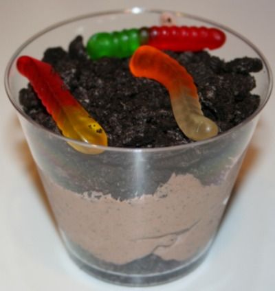 Need a quick and fun snack or dessert idea for your kids?  This just might do the trick. The first time I had a Dirt Cup was when I was in third grade. I was at my friend Brittany’s house for a day of swimming.  Her mom made a Dirt Cup for us.  She put … Edible Dirt, Dirt Cup, Dirt Cups, Dirt Cake, Kid Snacks, Kids Treat, Kids Snacks, Cooking With Kids, Fun Snacks