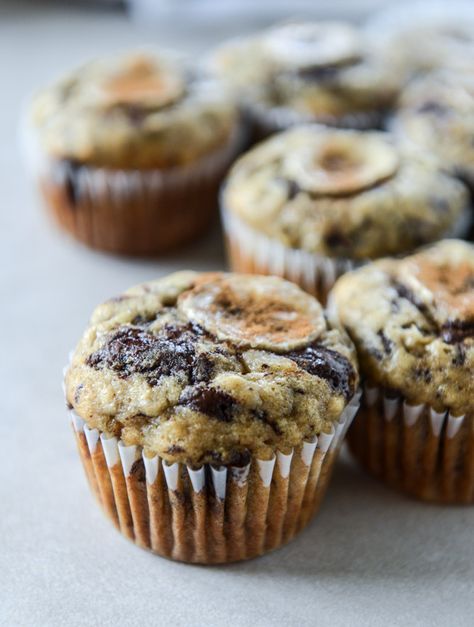 Banana Muffins with Olive Oil and Dark Chocolate. - How Sweet Eats Baking With Olive Oil, Chocolate Banana Muffins, Cooking With Olive Oil, Banana Muffins, Chocolate Banana, How Sweet Eats, Tasty Treats, Whole Wheat, Sugar And Spice