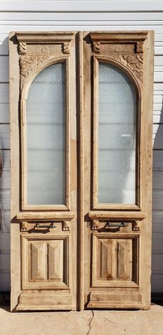 Pair of Wood Doors with Arched Single Glass Panes French Style Doors Interior, Unique French Doors, Antique Arched Doors, Arched Barn Doors In The House, Antique Wood Doors Interior, Antique Doors In House Entrance, Antique French Front Doors, Arched Sliding Doors Interior, Vintage Wood Doors