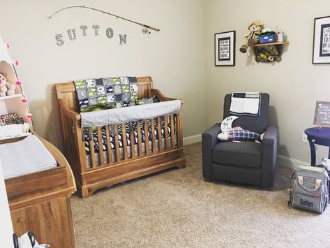 Bass fishing theme nursery Fishing Theme Nursery Boys, Simple Fishing Nursery, Lodge Fishing Theme Nursery, Fish Themed Nursery, Fishing Theme Nursery, Nursery Fishing Theme, Woodsy Nursery With Fishing, Boy Nursery Fishing Theme, Fishing Themed Nursery