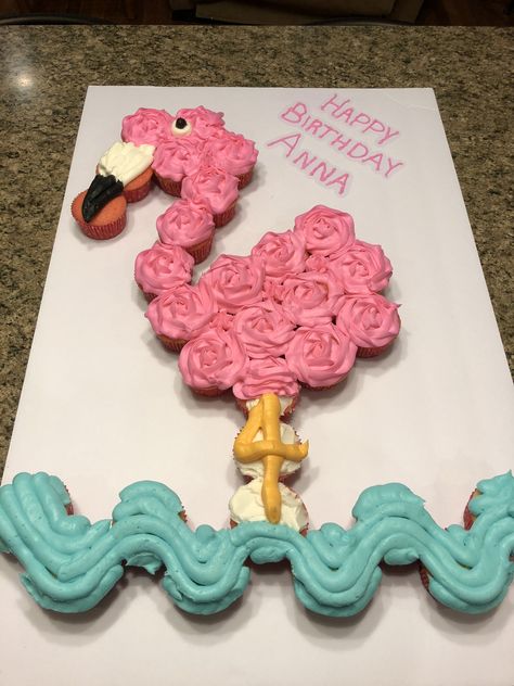 Perfect fourth birthday flamingo cupcake cake. I’m in love with the (4) legs! Flamingo Birthday Party Cake Ideas, Flamingo Pull Apart Cupcakes, Flamingo Birthday Cupcakes, Flamingo Cupcakes Ideas, Flamingo Cake Ideas, Luau Cupcake Cake, Pull Apart Flamingo Cupcake Cake, Flamingo Cupcake Cake, Flamingo Sheet Cake Birthday