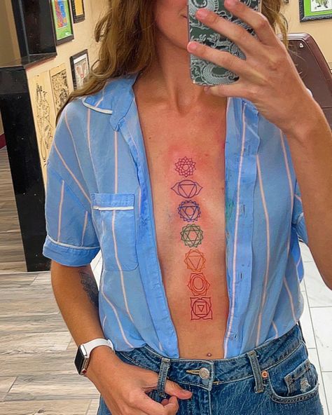 Chakra Tattoo Thigh, Chakras Down Spine Tattoo, Chest Chakra Tattoo, Sternum Chakra Tattoo, Chakra Tattoo Sternum, Chakra Tattoo Spine Color, Anahata Chakra Tattoo, Chakra Tattoo Spine, Throat Chakra Tattoo