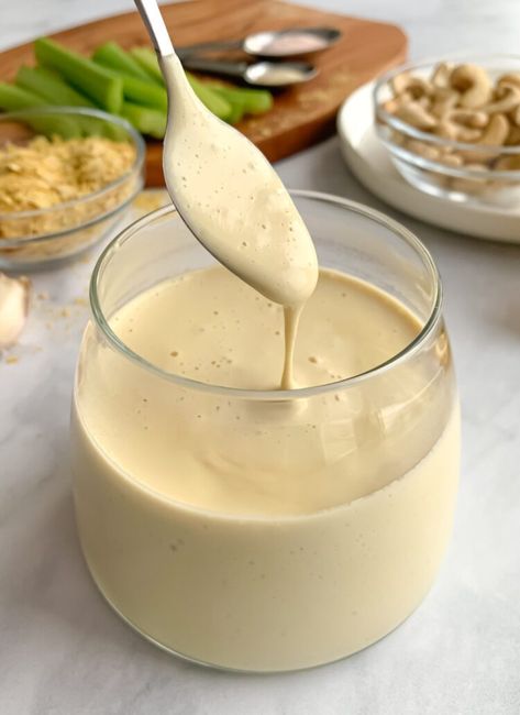 I get asked for this recipe everytime I serve it to my friends. It's made using hormone balancing cashews and is irresistible on celery, nachos, burgers and more! Dairy Free Cheese Sauce, Vegan Cashew Cheese Sauce, Nutrition Facts Healthy Eating, Dairy Free Queso, Cashew Cheese Sauce, Vegan Soul Food, Queso Recipe, Vegan Cheese Sauce, Cashew Cheese