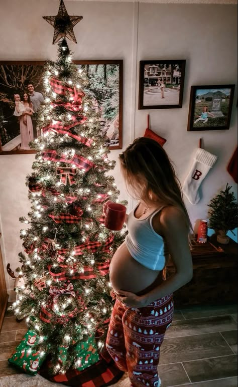 Pregnant During Christmas, Christmas Tree Bump Picture, Christmas Pregnancy Pictures, Pregnancy Outfits Christmas, Maternity Photos Christmas, Christmas Maternity Pictures At Home, Christmas Bump Pictures, Christmas Tree Pregnancy Photo, Holiday Maternity Photos