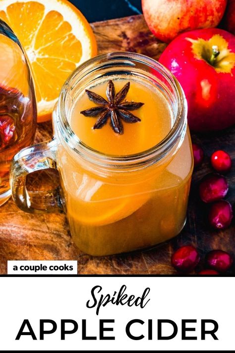 This hot spiked apple cider recipe hits all the cozy notes! Rum or bourbon perfectly complement the cinnamon, cloves, and star anise. #drinks #cocktails #applecider #spiked #cider #spikedapplecider #spikedcider #hotdrink #fall Hot Spiked Apple Cider Recipe, Hot Alcoholic Drinks, Hot Buttered Rum Mix, Spiked Apple Cider Recipe, Crockpot Apple Cider, Liqueur Cocktails, Spiked Cider, Rum Swizzle, Spiked Apple Cider