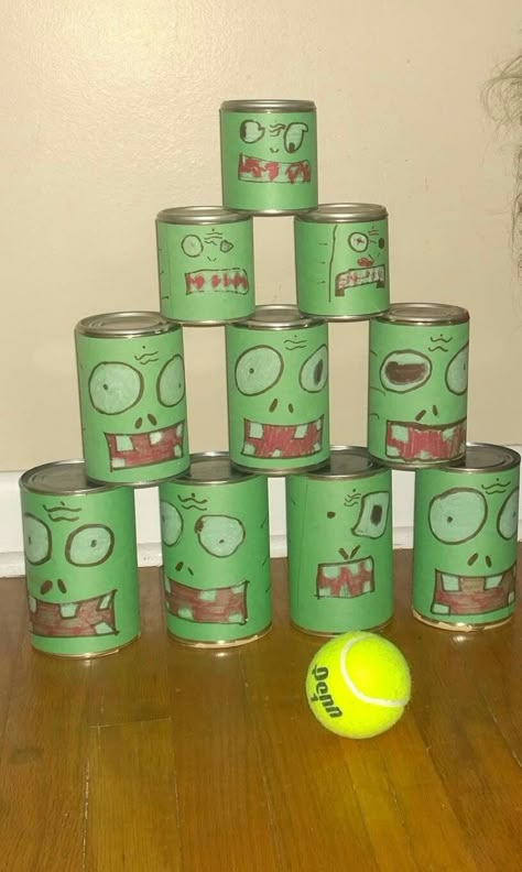 Plants vs Zombies tennis ball Pea Shooter game. Zombie bowling. Zombie Apocalypse Birthday Party, Plants Vs Zombies Birthday Party Games, Plants Vs Zombies Trunk Or Treat, Plants Vs Zombies Birthday Party Ideas, Plant Vs Zombies Party Ideas, Zombie Party Games, Zombie Birthday Party Decorations, Zombie Books, Zombie Crafts