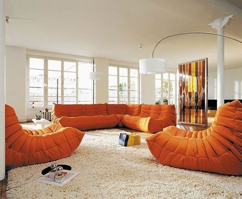 The Togo Sofa and 3 Cheaper Alternatives Toga Sofa, 1970s Interior Design, Orange Couch, Orange Sofa, Togo Sofa, Ligne Roset, Design Del Prodotto, Spacious Living Room, Room Colors