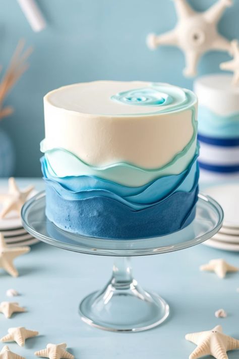 A selection of 24 beautiful ombre cake designs showcasing stunning gradient styles like ocean wave ombre, perfect for improving your baking skills and adding flair to special occasions. This pin features 1 eye-catching image. Water Themed Birthday Party Cake, Fisherman Cakes For Men, Waves Birthday Cake, Beach Themed Cake Ideas, Ocean Cake Design, Birthday Cake Sea Theme, Wave Cake Ideas, Sea Theme Birthday Cake, Beach Themed Birthday Cakes