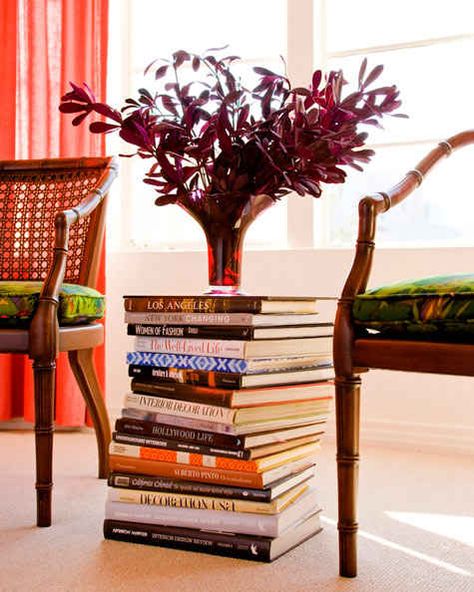 Stack books to make a low surface for display. | 24 Creative Ways To Decorate Your Place For Free Urban Apartment Decor, Pvc Furniture Plans, Color Of The Week, Decorating Bookshelves, Urban Apartment, Book Table, Urban Furniture, Decorated Jars, Design Sponge