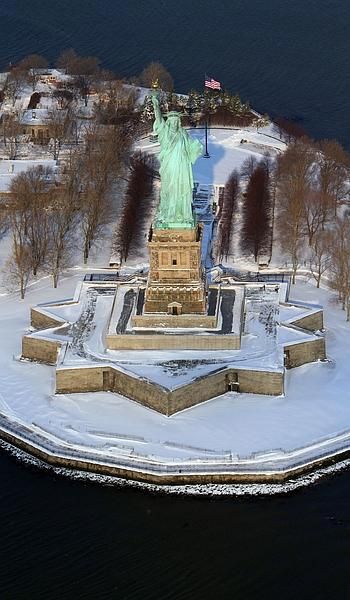 This snow-blanketed Liberty Island photograph is from 2011. Liberty Christmas, Hooked On A Feeling, Liberty Island, Close Proximity, Lady Liberty, Historical Facts, Statue Of Liberty, New York City, Statue