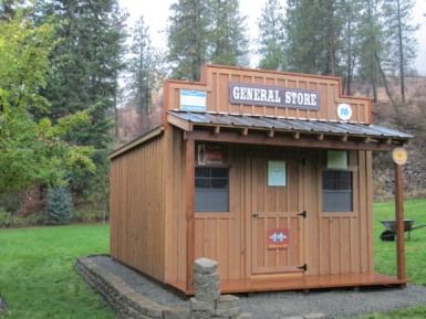 General Store - by Sturdy Built Sheds, LLC General Store Playhouse, General Store Shed, Country Shed Ideas, Mini General Store, Food Storage Shed, General Store Ideas Small Towns, Boy Playhouse, Tuff Shed House, Shed Store