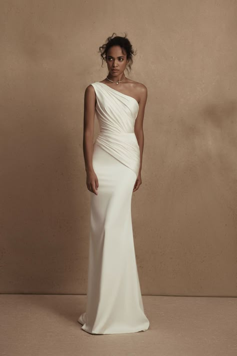 Simple sheath wedding dress with modern one shoulder neckline and wrap bodiceSatin bridal gownWONAConcept Wedding Dresses 2023Personality Bridal CollectionRueBelle The MagazineSee more gorgeous bridal gowns and find your dream wedding dress by clicking on the photo Wedding Dresses 2023, Elegant Wedding Gown, Minimal Wedding Dress, Dream Wedding Ideas Dresses, Classic Wedding Dress, Fitted Wedding Dress, Dresses 2023, Perfect Wedding Dress, Elegant Wedding Dress