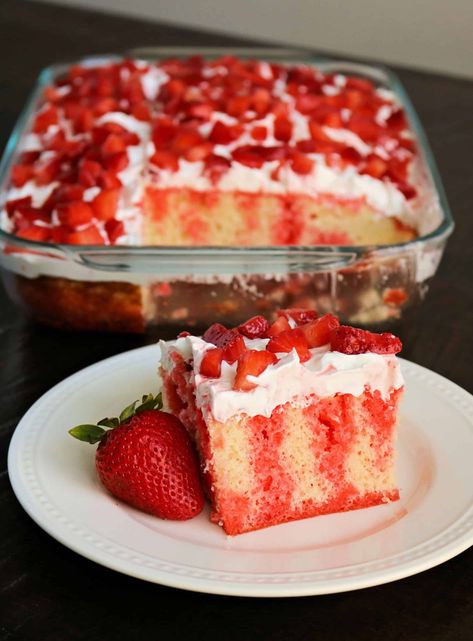 Try my Easy Strawberry Jello Poke Cake for a light and refreshing summer cake your family and friends will love! It's made with just 5 ingredients including fresh strawberries, strawberry jello mix, and whipped cream topping, and is so delicious! #strawberrypokecake #jellopokecake #pokecake #strawberriesandcream #dessert Strawberry Poke Cake With Pudding, Strawberry Jello Poke Cake, Jello Deserts, Strawberry Jello Cake, Jello Cake Recipes, Strawberry Poke Cake, Poke Cake Jello, Strawberry Poke Cakes, Thanksgiving Dish