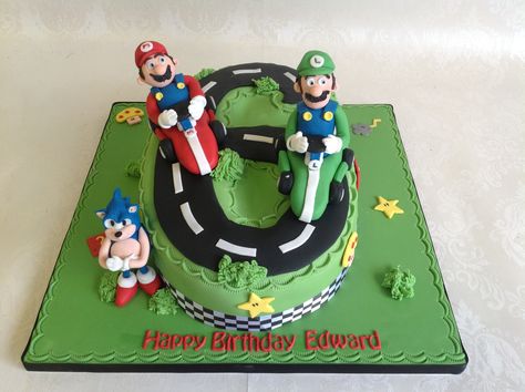 Number 6 shaped Mario Themed 6th Birthday cake with handmade character models Number 6 Mario Cake, Number 6 Cake, Mario Kart Cake, 6th Birthday Cake, 6th Birthday Cakes, Mario Cake, 6 Cake, Mario Birthday, Mario Party