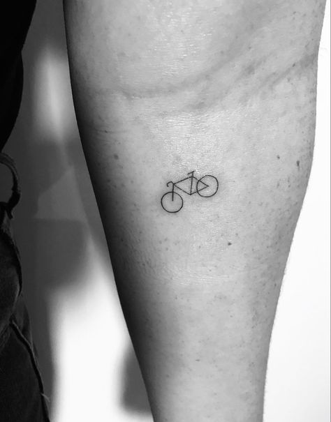 bicycle tattoo Mini Bike Tattoo, Tandem Bicycle Tattoo, Minimalist Bicycle Tattoo, Tattoo Bicycle Ideas, Dainty Bike Tattoo, Cute Bike Tattoo, Minimalist Cycling Tattoo, Simple Bicycle Tattoo, Minimalist Bike Tattoo