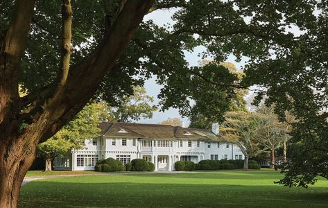 A Traditional Hamptons Estate, With a French Twist Hamptons Estate, Traditional Hamptons, Hampton Estates, Pierre Yovanovitch, Hamptons Summer, Small Castles, American Architecture, Hamptons House, The Wall Street Journal