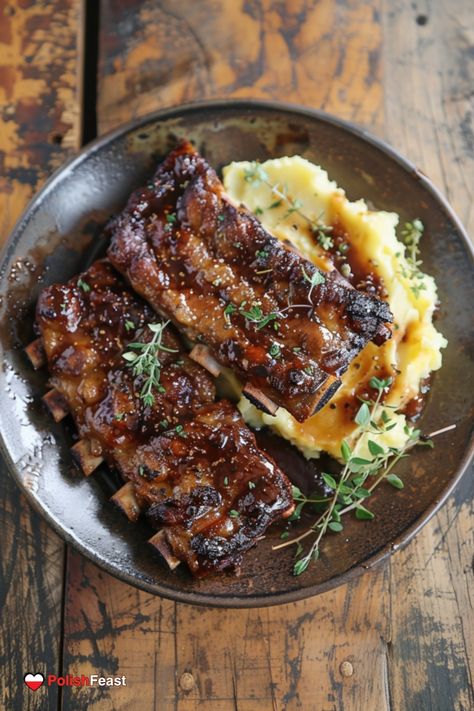 Indulge in the rich flavors of a classic Polish Pork Ribs dish, known as Polish żeberka. Delight in the heartwarming goodness of this traditional recipe that promises to elevate your family meals with its comforting and satisfying essence. Perfect for all occasions beyond just family dinners, this hearty meal is sure to become a favorite at your table. Polish Recipe, Pork Ribs Recipe, Slow Cooked Meat, Lamb Ribs, Pork Rib Recipes, Flavorful Vegetables, Polish Food, Ribs Recipe, Hearty Meal