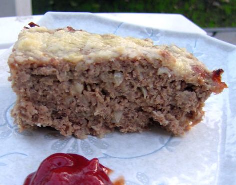 The recipe comes from the Sunset Ground Beef Cookbook 1968 and has been one of our all-time favorite meatloaf recipes because of the taste as well as how quickly everything is put together and baked. To up the taste I have included 1 clove of garlic minced. It's a very light textured meatloaf in a shallow pan instead of the typical loaf pan style. I am mostly putting this recipe here for safekeeping since my book is getting more and more stained after 4 decades of use. I normally eat this meat Tofu Meatloaf, Vegan Meatloaf Recipe, Cheese Meatloaf, Tartiflette Recipe, Cheese Stuffed Meatloaf, Vegan Meatloaf, Cottage Cheese Recipes, Steak Sauce, Tacos Beef