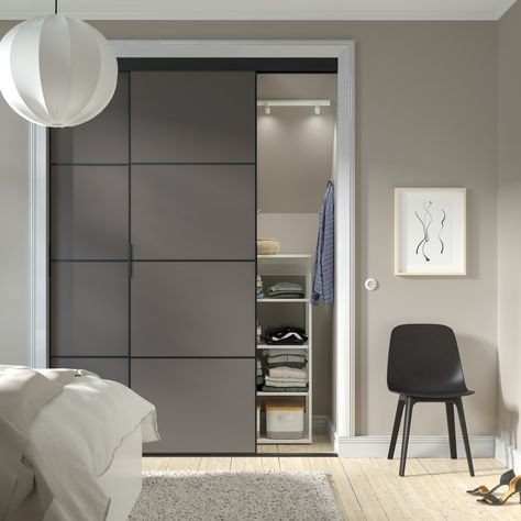 Save, create or even hide space with SKYTTA sliding doors. Ikea Sliding Door, Hidden Spaces, Pax Wardrobe, Ikea Store, Sliding Door Systems, Integrated Handles, Door Frame, Sliding Door, Solid Pine