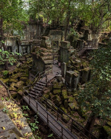 This hidden gem overtaken by nature is Beng Mealea, a temple totally immersed within the jungle. There’s overgrown trees, roots, and vines interweaved throughout, and it’s much less crowded than other temples. So worth the trip! #cambodia #jungle #travelphotos #temples #historical #bucketlist #travelinspiration #traveltips Overgrown Aesthetic, Beng Mealea, Overtaken By Nature, Koh Ker, Crimson Dawn, Jungle Temple, Angkor Wat Temple, Temple Ruins, Pokemon Regions