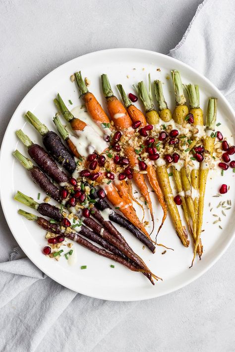 MAPLE ROASTED CARROTS WITH TAHINI MISO DRESSING Healthy Holiday Side Dishes, Healthy Holiday Sides, Maple Roasted Carrots, Miso Dressing, Holiday Side Dishes, Yogurt Sauce, Healthy Holidays, Roasted Carrots, Thanksgiving Side Dishes