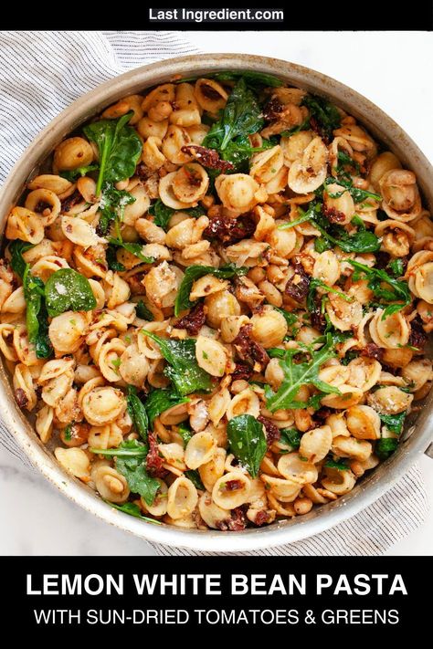 Simple pantry staples and fresh ingredients make this white bean pasta an easy vegetarian dinner recipe. It has sun-dried tomatoes, cannellini beans and baby greens. You simmer orecchiette and then sauté the beans with garlic and seasonings. All the ingredients come together with grated pecorino cheese, toasted walnuts and fresh herbs. Recipes With Canned Tomatoes, White Bean Pasta, Burst Tomato, Cavatelli Pasta, Chickpea Spinach, Cauliflower And Broccoli, Quinoa Pasta, Cherry Tomato Sauce, Pasta Noodle Recipe