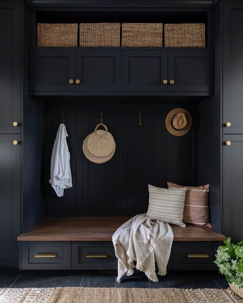 Mudroom | Design by Natalia Avalos Interiors | Spring has sprung and what better way to start the season than by decluttering your space? Boxes and baskets keep scattered items tucked away while providing storage and style! 🌼🌷🧺 Happy #SpringCleaning Black And Wood Mudroom, Witching Hour Benjamin Moore, Black Mudroom, Entryway With Bench, Entrance Storage, Small Mudroom, Small Mudroom Ideas, Entry Cabinet, Mudroom Remodel