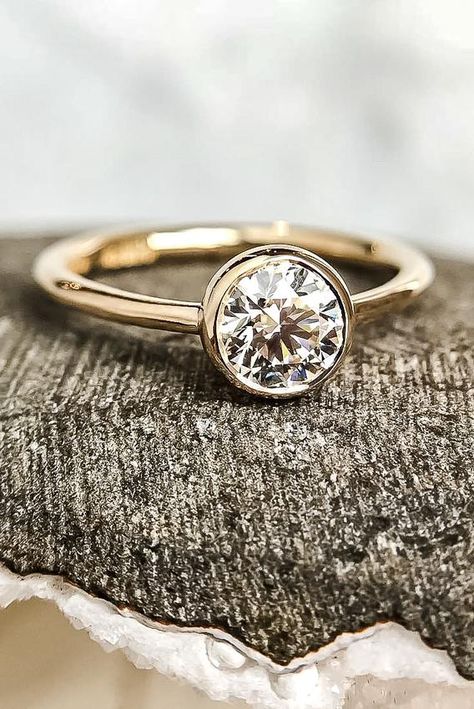 Gold bezel engagement ring