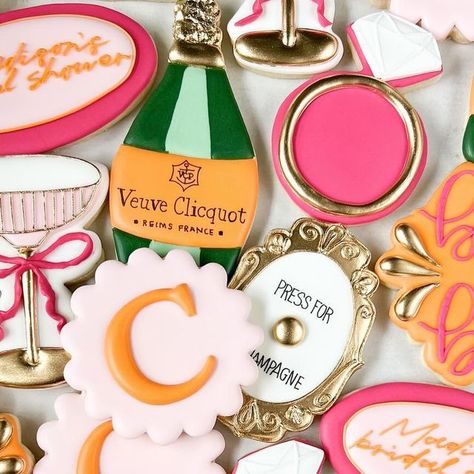 Baked by Becca on Instagram: "Madison’s bridal shower🍾🥂🧡🩷 full event done by @weliketoparty_tx   #vuevecookies #vuevecliquotcookies #champganebottlecookies #bridalshowercookies #ringcookie" Bridal Shower Inspo, Bridal Shower Cookies, Bachelorette Decorations, Fancy Cookies, Food Inspo, April 22, Event Ideas, Cookie Designs, Cookie Cake