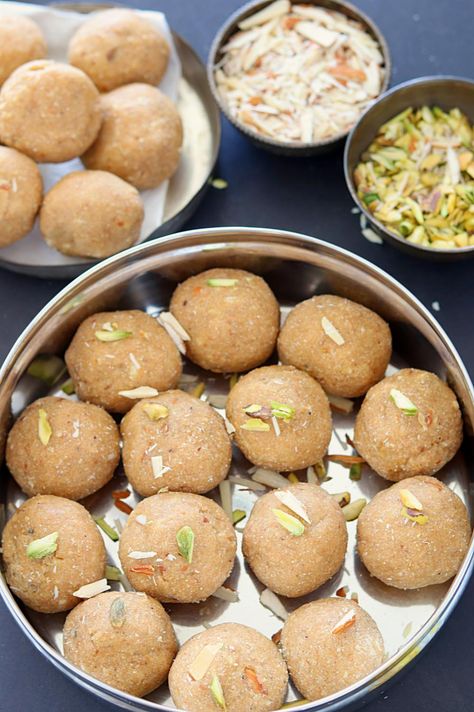 Deliciously yummy Aate ki pinni is a traditional Punjabi sweet made with whole wheat flour, semolina and dry nuts. Step by step Aate ki Pinni recipe. How to make Atte ki Pinni. Punjabi pinnie, atte ki pinni, atte ke ladoo, Aate Ki Pinni Recipe. Simple and easy wintry sweet. Pinni Recipe Punjabi, Atta Biscuits Recipe, Pinni Recipe, Laddoo Recipe, Punjabi Recipes, Meal Plan Prep, Curry Dip, Indian Mithai, Veg Recipes Of India