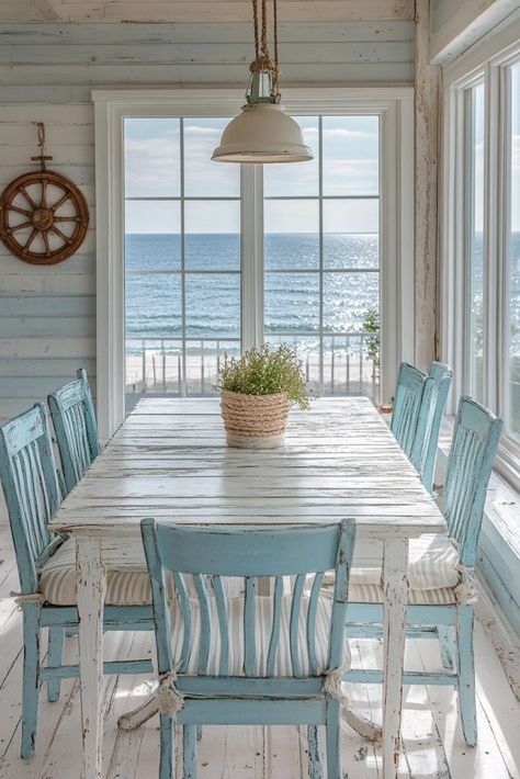 29 Shabby Chic Beach Cottage Decor Ideas for a Charming Coastal Home 7 Beach Cottage Kitchen, Rustic Beach Decor, Cottage Chairs, Chic Beach House, Shabby Chic Beach, Mismatched Chairs, Coastal Dining Room, Dining Room Paint, Rustic Wooden Table