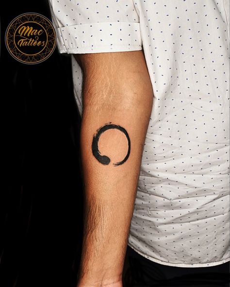 Enso is the Japanese word for the circle and a symbol closely related to Zen Buddhism. The enso symbolises absolute enlightenment, strength, elegance, the universe and the void . Inked at @mac_tattoos_original #hauzkhas For appointments do call or what’s app us on : +91 8851 012 863 +91 7042 130 654 Thanks for looking 😊 #ensotattoo #forearmtattoo #buddhatattoodesign #japanesetattoos #smalltattoosformen #delhitattoos #delhitattooshop #besttattooartistindelhi #besttattooindelhi Void Tattoo, Enso Tattoo, Eastern Spirituality, Enso Symbol, Buddha Tattoo Design, Japanese Lacquerware, Japanese Word, Zen Buddhism, Small Tattoos For Guys