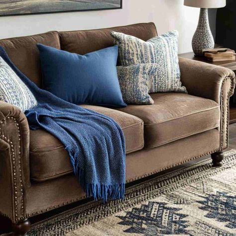 20 Stunning Brown Couch Living Room Ideas You’ll Love Blue And Brown Pillows On Couch, Tweed Couch, Brown Sectional Living Room, Blue And Brown Living Room, White Accent Pillows, Royal Blue Pillows, Brown Couch Decor, Brown Couch Living Room Ideas, Blue Grey Living Room