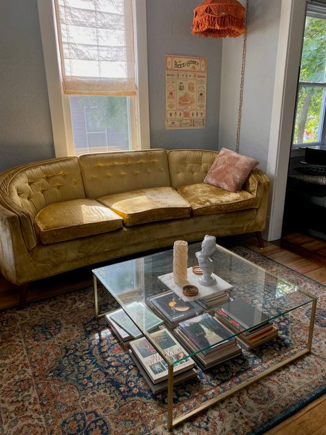 Coffee Table Gold Glass, Yellow Aesthetic Living Room Decor, Vintage Yellow Couch Living Room, Light Yellow Couch Living Room Ideas, Golden Couch Living Rooms, Modern Velvet Couch, Yellow Velvet Couch Living Room, Mustard Rug Living Room, Velvet Couch Aesthetic