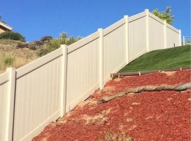 How to Install Vinyl Fence on a Slope - Knowledge - Zhejiang Showtech Outdoor Products Co., Ltd Vinyl Fence On Sloped Yard, Fence On Sloped Yard, Vinyl Fences, Privacy Fence Panels, Pvc Fence, Sloped Yard, Physical And Chemical Properties, Fencing Material, Farm Fence