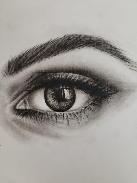 Black and grey eye drawing done with charcoal Eyes Drawing Shading, Small Charcoal Drawing, Charcoal Pencil Eye Sketch, Eye Drawing Charcoal, Charcoal Eyes Sketch, Eye Charcoal Drawing, Eye Shading Drawing, Charcoal Easy Drawing, Eye With Reflection Drawing