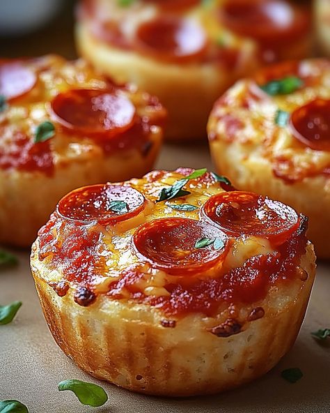 🍕 Pepperoni Pizza Muffins 🧀 Your Perfect Snack for Game Day or Family Nights! Quick, cheesy, and utterly delicious! 🍽️ Ingredients 🍽️ - 100 ml milk - 50g mini pepperoni slices - 150g all-purpose flour - 1 large egg - 100g marinara sauce - 2 tsp baking powder - 50g melted butter - 100g mozzarella cheese, shredded - Fresh basil, chopped for garnish - 1/2 tsp salt 🧑‍🍳 Directions 🧑‍🍳 1. Prepare the Batter: Start by combining the all-purpose flour, baking powder, and salt in a large mixing bo... Perfect Pizza Dough, Pizza Muffins, Meal Prep Snacks, Mini Pizzas, Food Babe, Edible Food, Food Drinks Dessert, Food Recepie, Recipes From Heaven