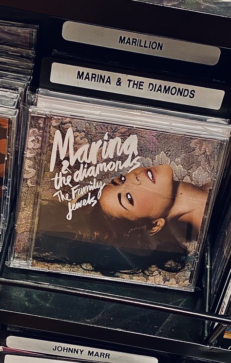 Marina and the diamonds cd Marina And The Diamonds Aesthetic, Marina And The Diamonds Wallpaper Iphone, Marina And The Diamonds Aesthetic Wallpaper, Marina And The Diamond, Marina Aesthetic, Marina Album Cover, Marina And The Diamonds Mans World, Marina And The Diamonds Album Cover, Marina Diamandis