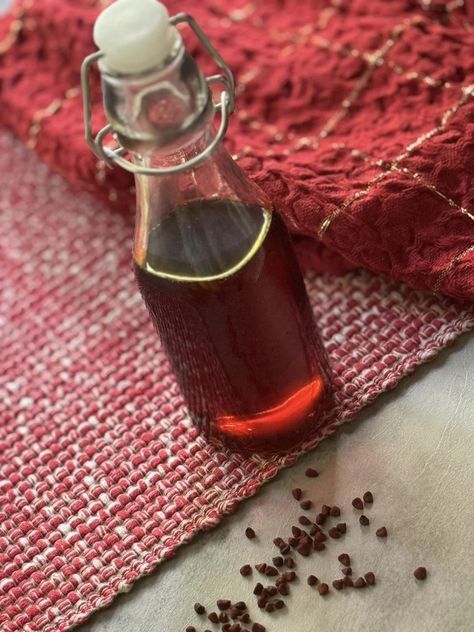 How to Make Annatto-Infused Oil | Aceite de Achiote Recipe Olive Oil Recipes, Rican Food, Infused Oil, Puerto Rican Recipes, Infused Oils, Puerto Rican, Olive Oil, Condiments