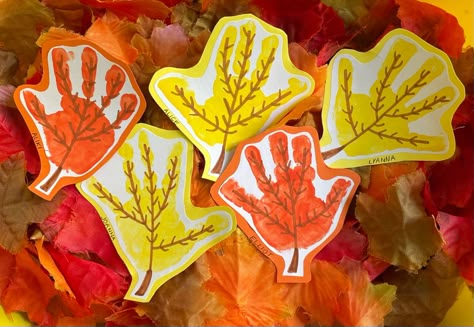 Fall leaf hand print craft for toddlers Hand Leaves Craft, Leaf Hand Print Craft, Hand Leaf Craft, Autumn Leaf Art For Kids, Hand Print Leaves, Leaf Handprint Art, Leaf Crafts For Toddlers, Diy Leaf Garland, Waldorf Learning