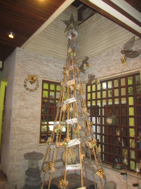 OUR 12FT. BAMBOO CHRISTMAS TREE Bamboo Christmas Tree Diy, House Ideas Interior Living Room, Sticks In Vase, Filipino Christmas Tree, Bamboo Decoration Ideas, Bamboo Christmas Tree, House Ideas Interior, Bamboo Ideas, Filipino Christmas