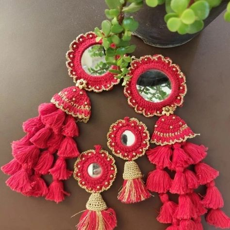 Crochet Red Mirror Tassels Perfect for your festive season ✨. Dm to buy! Instagram: kalagreh Mirror Tassels, Chania Choli, Kuchu Designs, Saree Kuchu Designs, Kurti Embroidery, Mirror Embroidery, Embroidery On Kurtis, Kurti Embroidery Design, Red Mirror