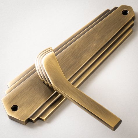 Waldorf Door Handles On Backplate from our Art Deco range of door furniture. These lever handles are suitable for internal and external doors. The Waldorf has a classic trapezoidal stepped shape with a stylised lever. This is a stunning handle with a striking Art Deco design, ideal for period properties, especially houses built in the 1920s and 1930s. The Waldorf Handles are made from hot forged solid brass and available in a choice of beautiful high quality lacquer finishes: Aged Brass, Matt Br Art Deco Door Handle, Art Deco Internal Doors, Art Deco Door Handles, 1930s Doors, External Door Handles, Door Iron, Suffolk Latch, Internal Door Handles, Art Deco Door