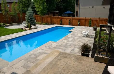 Lap Pool Dimensions: What’s the Best Size in 2024? Small Lap Pool, Fiberglass Pool Cost, Pool Dimensions, Lap Pool Designs, Pool Cost, Swimming Safety, Fiberglass Pool, Sloped Yard, Lap Swimming