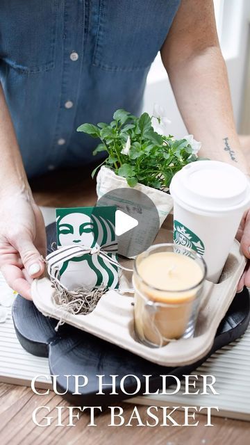 Melaine Thompson on Instagram: "RUUUUNNNN to your nearest coffee stand and grab a to go cup holder, Mom’s favorite drink, and a gift card.  Add potted or fresh flowers and a yummy candle!   Voila, the perfect unique Mother’s Day gift!   Here are some other creative things you could add to this gift basket.  Face mask  Sephora or Ulta gift card Cozy socks rolled up Perfume Body scrub Lip gloss Scrunchies Body butter Dish towel Measuring cups  Mini wine or champagne bottles  Tumbler or Stanley Chocolate  Sunscreen  Lotion Hairspray   PRO TIP- Make sure each item fits in each cup holder. I took mine with me when I was out shopping!   #giftsformom#mothersday#momsfavoritethings#momdayinspiration#uniquemomgifts#oneofakindgifts#mothersdayinspo" Cup Holder Gift Idea, Flower Gift Card Holder, Cup Holder Gift Basket, Cup Holder Bouquet, Drink Holder Gift Basket, Cup Carrier Gift Ideas, Gifts In A Cup, Coffee Cup Gift Ideas, Coffee Cup Gift Ideas Filled