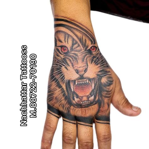 Hand Tattoo Meaningful, Tiger Hand Tattoo Design, Tiger Tattoo On Hand For Men, Lion Hand Tattoo Design, Tiger Hand Tattoo Men, Hand Tattoos Tiger, Hand Tattoos Lion, Lion On Hand Tattoo, Hand Lion Tattoo