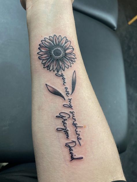 In Memory Sunflower Tattoo, Sunflower Tattoo With Words As Stem, Sunflower Signature Tattoo, Sunshine Arm Tattoo, Sunflower With Writing Tattoo, Sunflower Bible Verse Tattoo, Granddaughters Tattoo Ideas, Sunflower Memorial Tattoo Mom, Sunflower Tattoo With Name In Stem